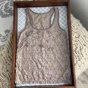 Taupe racerback tank top. Lace front and is in perfect condition. Size small